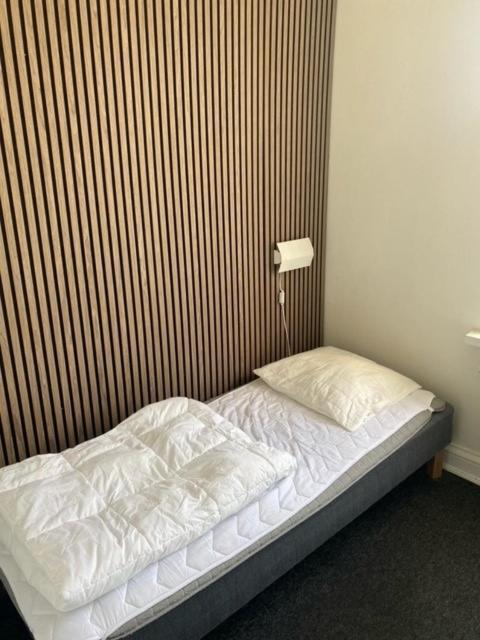 Danhostel Odense City Ngoại thất bức ảnh A bed with a duvet